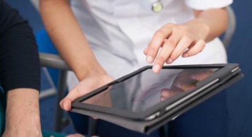 Therapist holding iPad